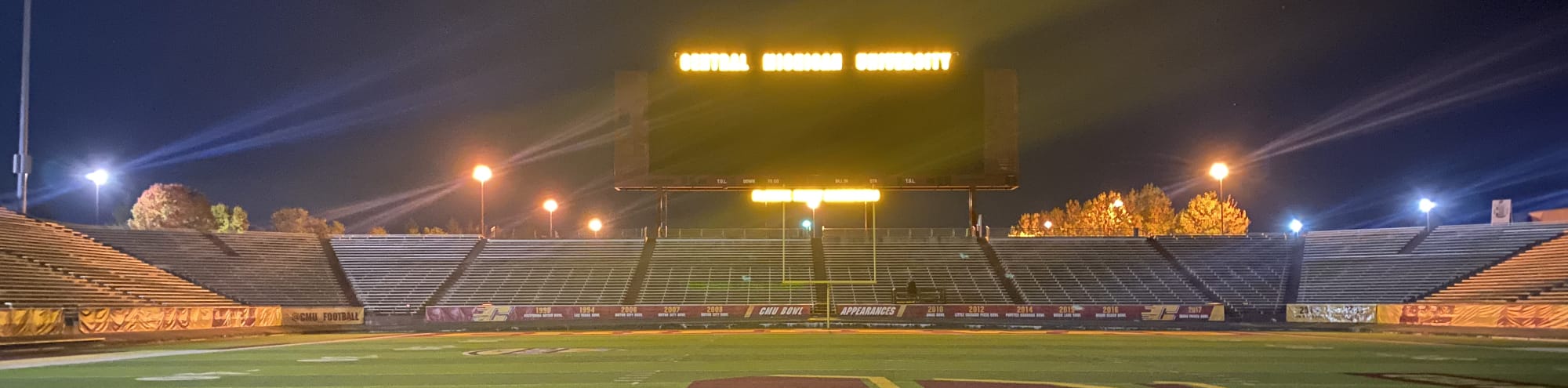 empty football stadium at night under the lights Houston