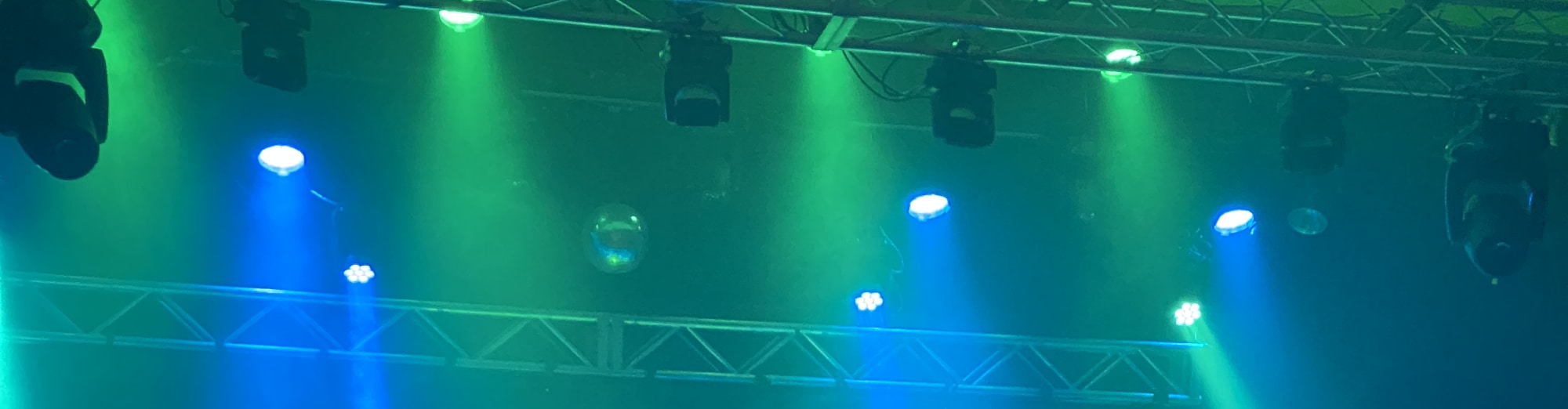 blue and green theater stage lights Houston